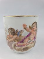 Teacup Cherubs Looking Over Cloud